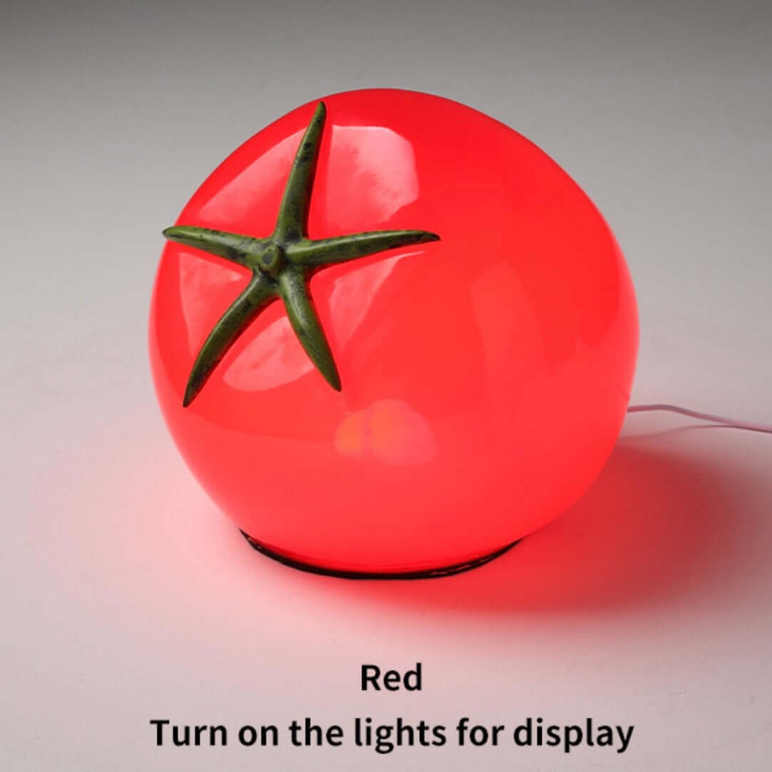 Tomato night light in red color, featuring a quirky tomato shape and soft LED illumination for bedside decor.