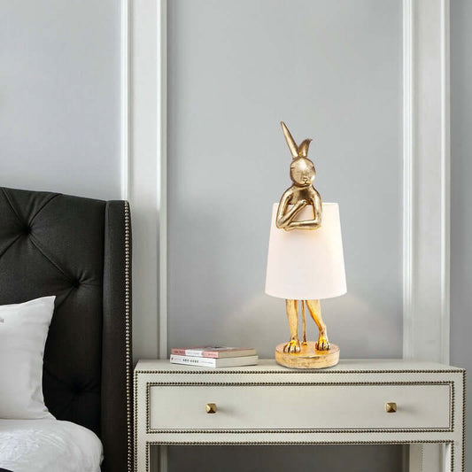 Whimsical apron-wearing bunny resin lamp