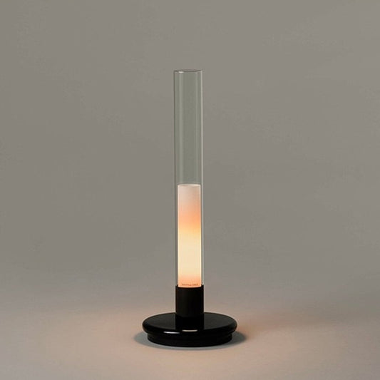 Lumiosa Solis rechargeable candle table lamp on modern dining table