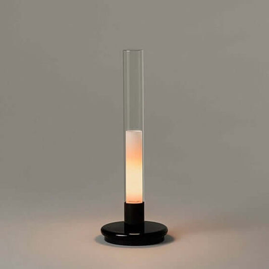 Lumiosa Solis rechargeable candle table lamp on modern dining table
