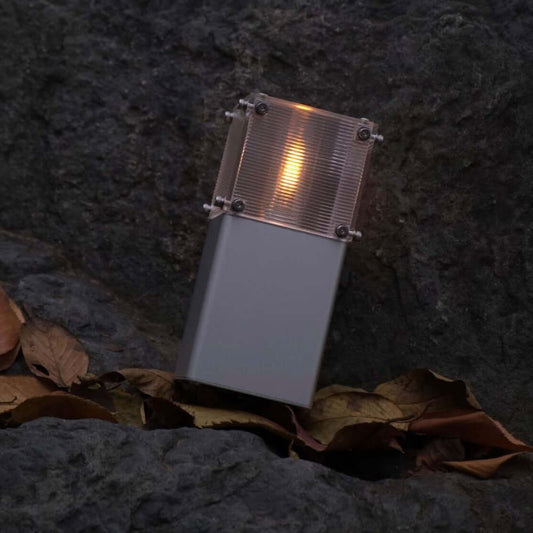 Candle-flame-rechargeable-mood-lamp-on-bedside-table