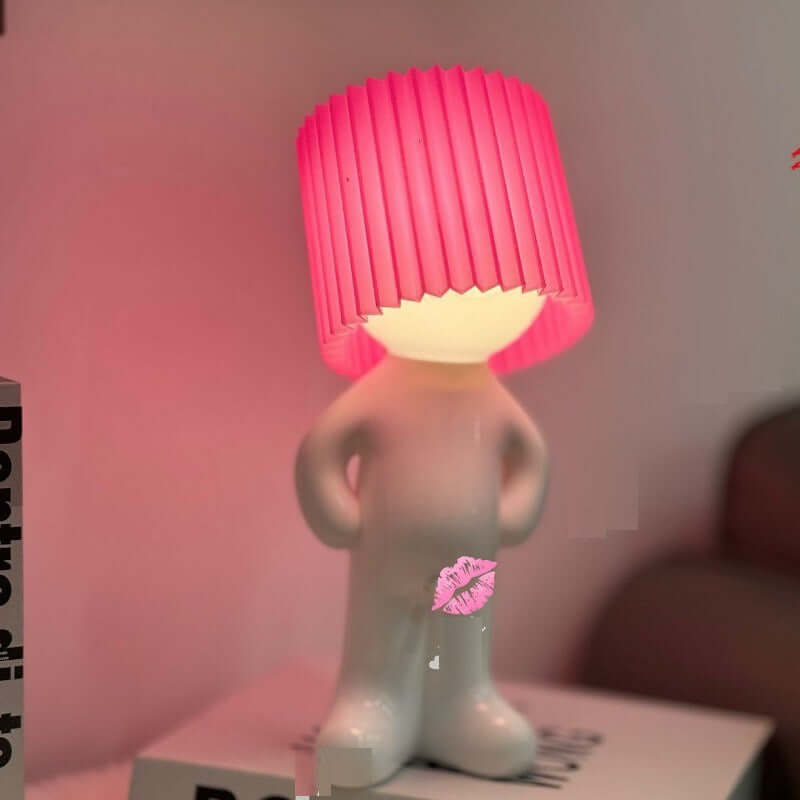 Soft ambient light from portable Shy Boy night lamp