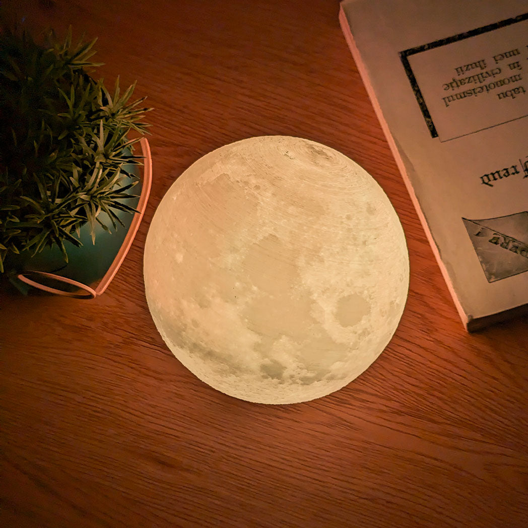 Moon-shaped night light