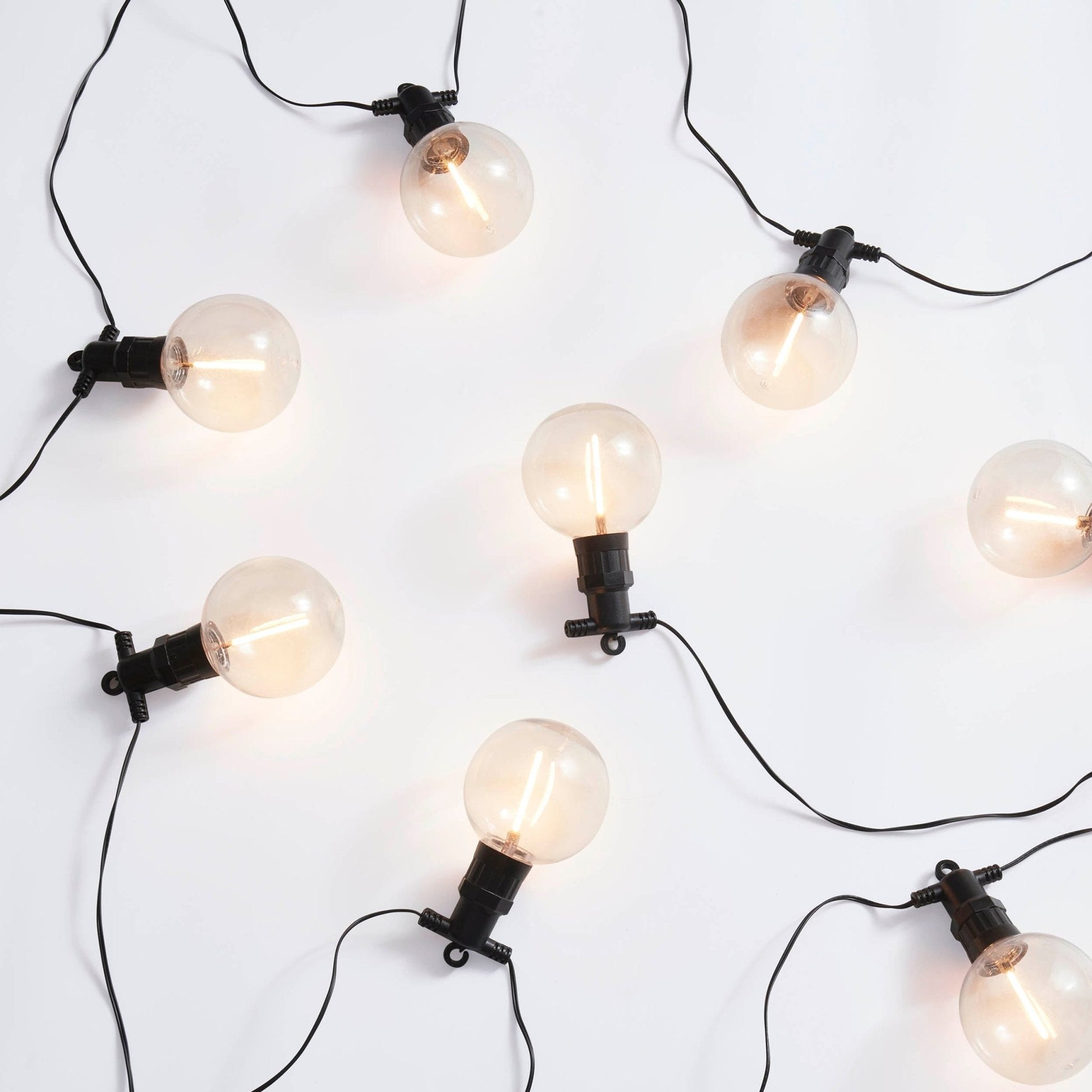 Patio string lights with exposed bulbs and hook hanging design