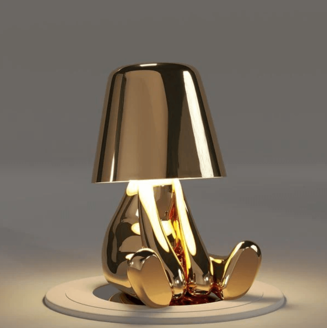 Thinker Brothers table lamp with golden finish, blending elegance and practicality in a modern design for stylish illumination.