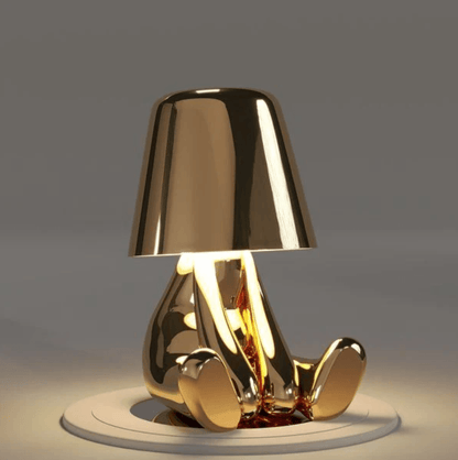 Thinker Brothers table lamp with golden finish, blending elegance and practicality in a modern design for stylish illumination.
