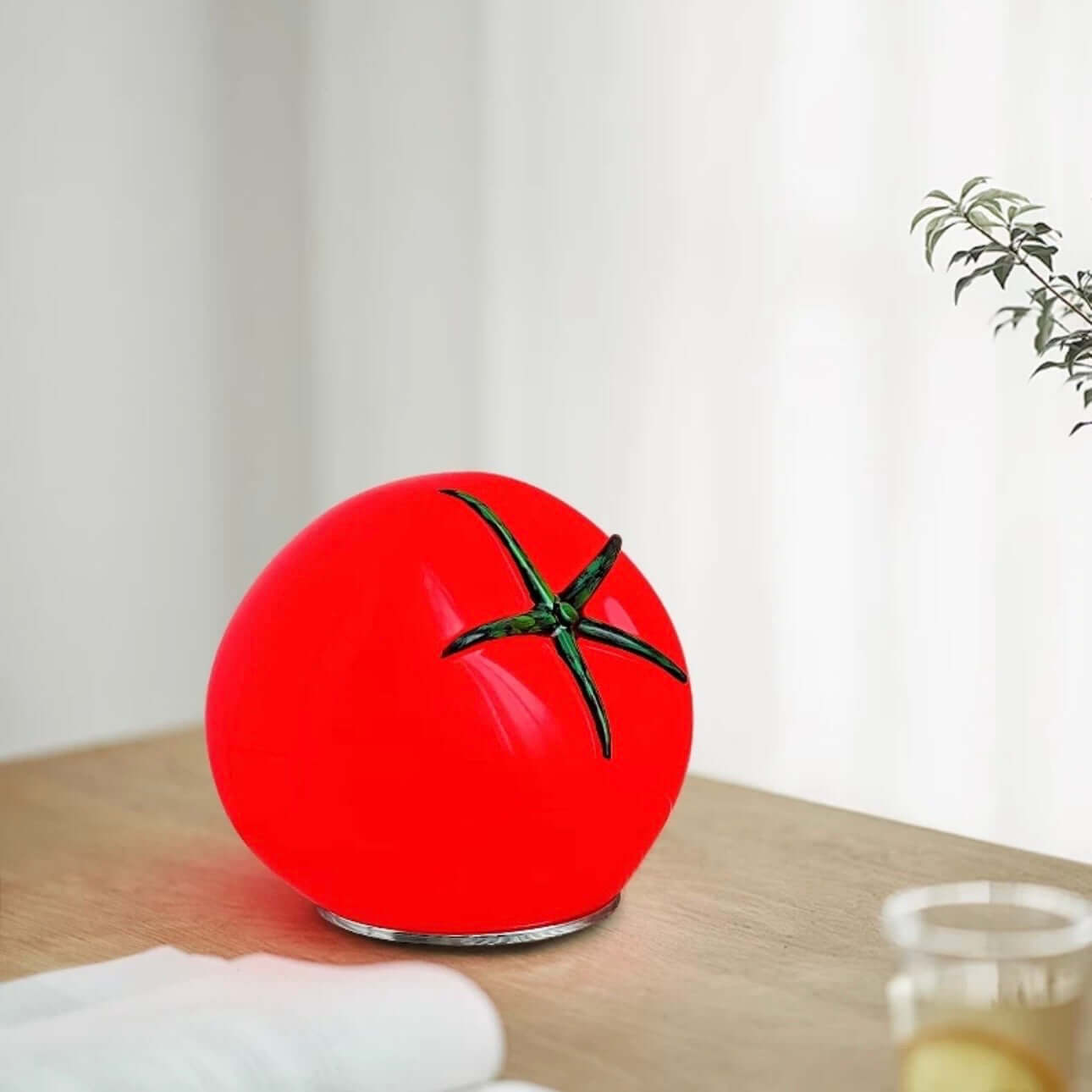 Tomato Night Light – Cute retro bedside lamp with a vibrant red tomato design on a wooden table.