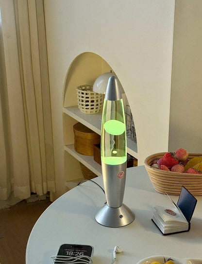 color changing lava lamp on bedside table creating relaxing atmosphere