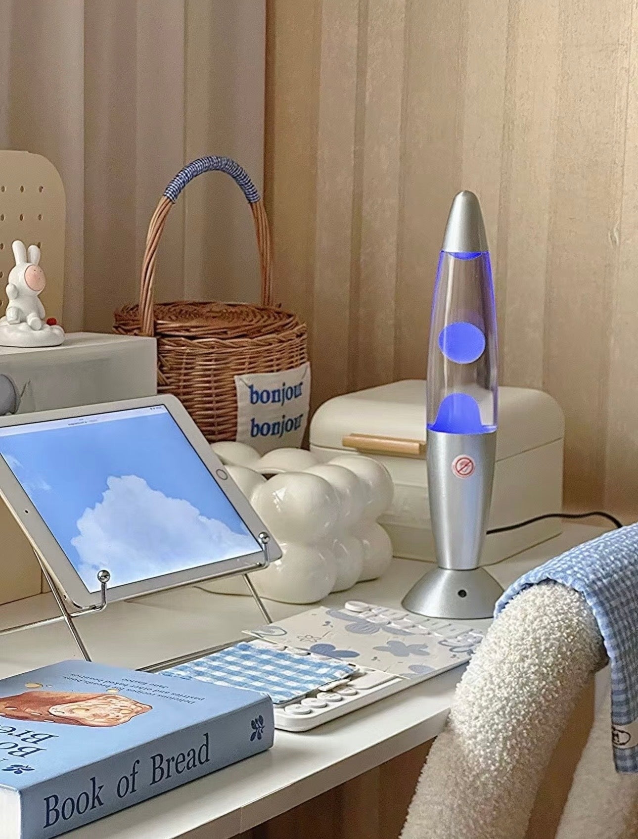 color changing lava lamp on bedside table creating relaxing atmosphere