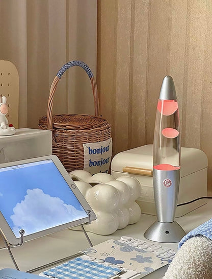 color changing lava lamp on bedside table creating relaxing atmosphere
