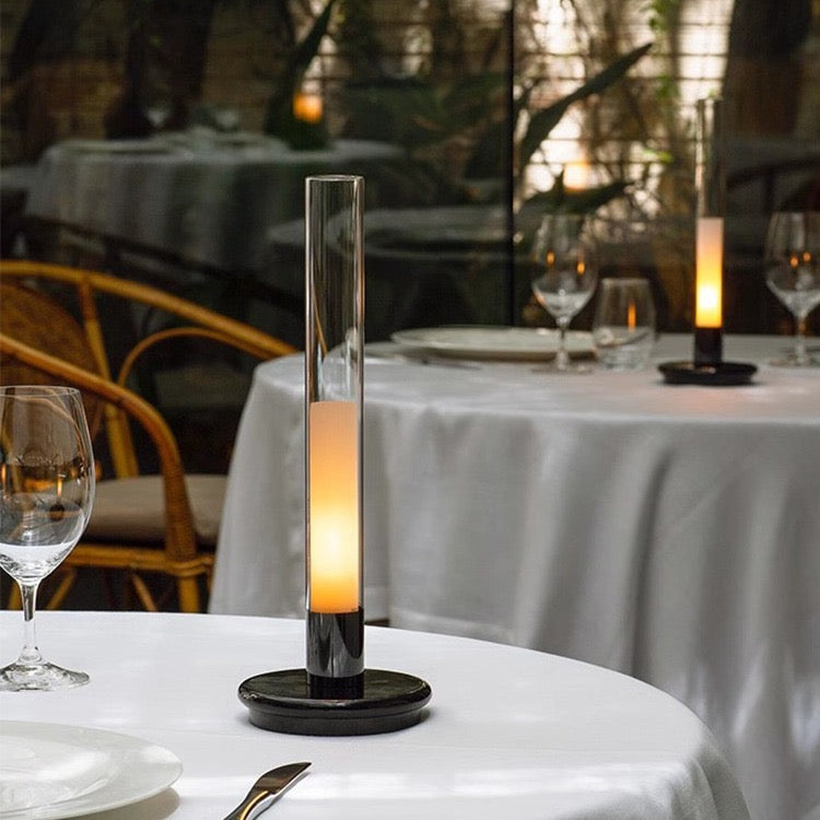 Lumiosa Solis rechargeable candle table lamp on modern dining table