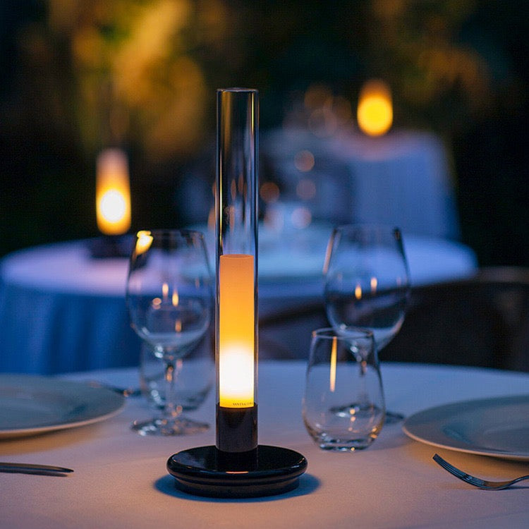 Lumiosa Solis rechargeable candle table lamp on modern dining table