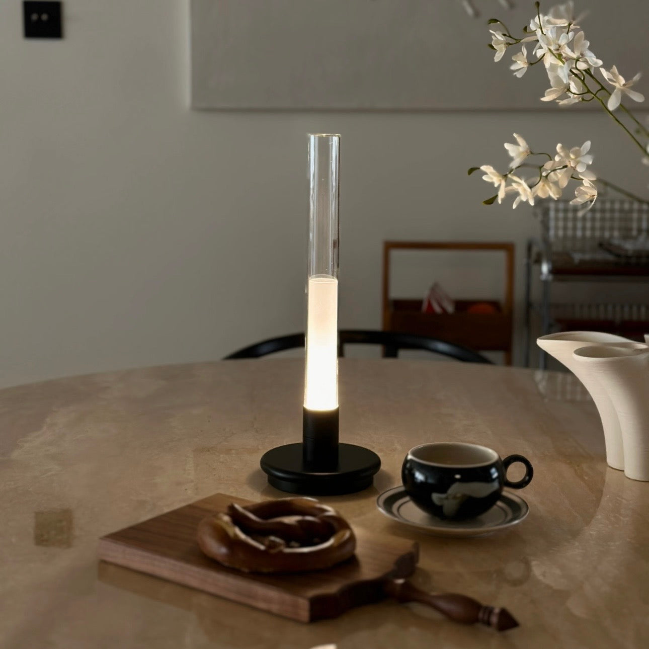 Lumiosa Solis rechargeable candle table lamp on modern dining table