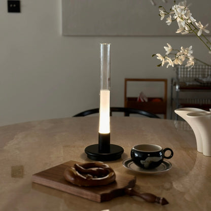 Lumiosa Solis rechargeable candle table lamp on modern dining table