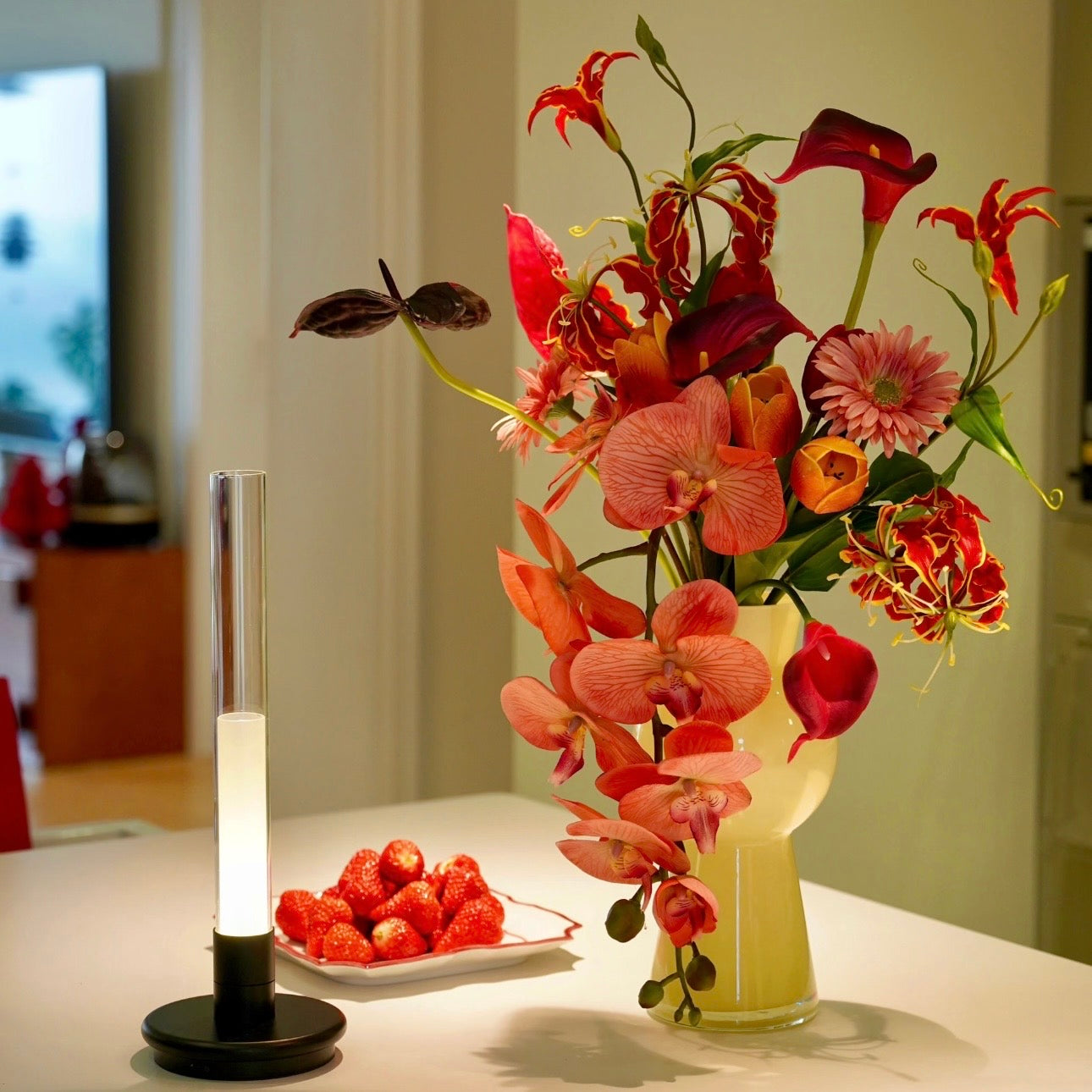 Lumiosa Solis rechargeable candle table lamp on modern dining table