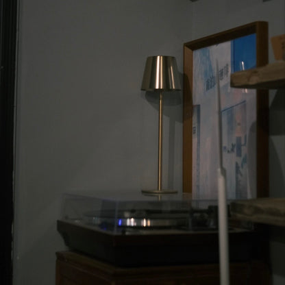 Cordless Gold Table Lamp Creating Warm Ambient Lighting