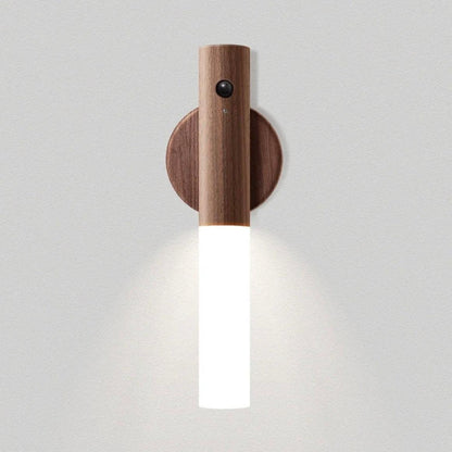 Wooden wall lantern with magnetic base and frosted glass, providing warm light for stylish home decor.