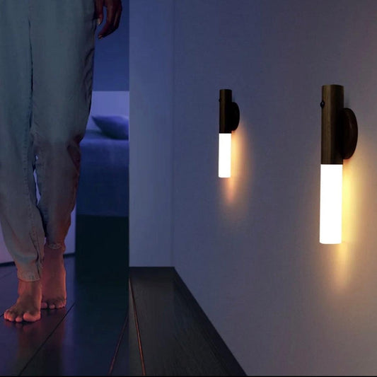 Wooden wall lantern illuminating a hallway, showcasing warm light and modern design for stylish home decor.
