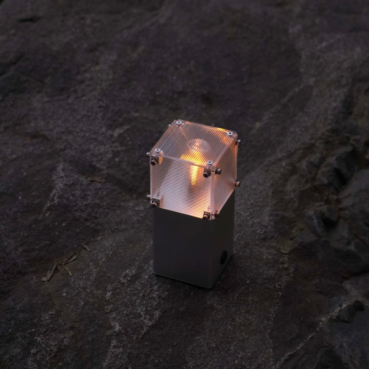 Modern aluminum and acrylic geometric lamp base with 0.5W power