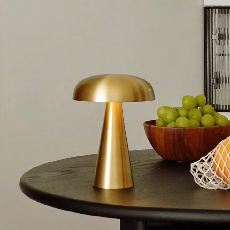 Metal mushroom table lamp with touch control on bedside table