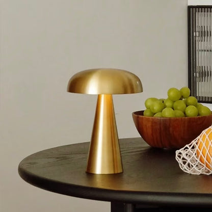 Metal mushroom table lamp with touch control on bedside table