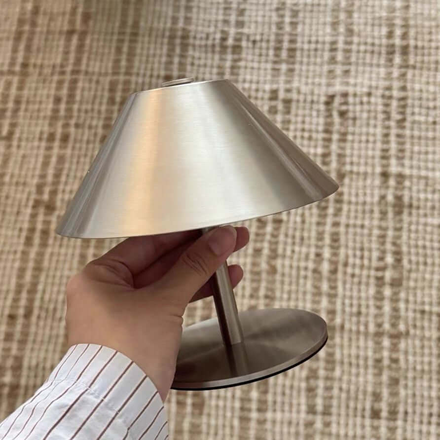Touch-controlled table lamp with three light color settings
