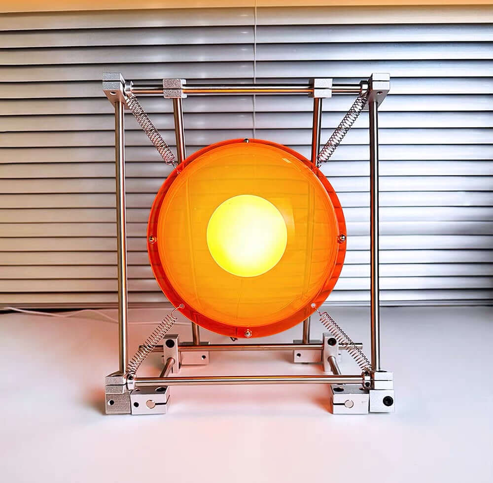Orange acrylic table lamp illuminated with neutral white light