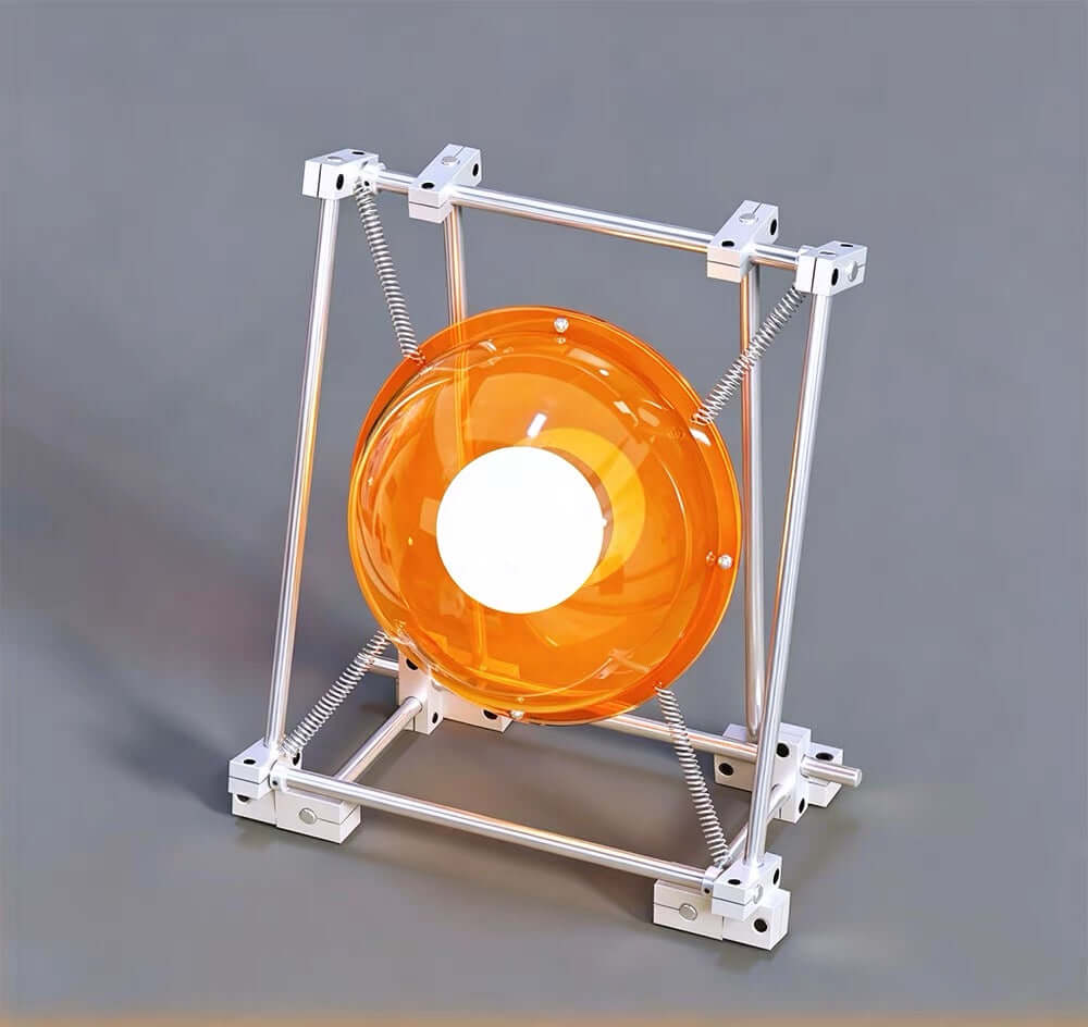 Sculptural orange acrylic table lamp with stainless steel frame and exposed springs