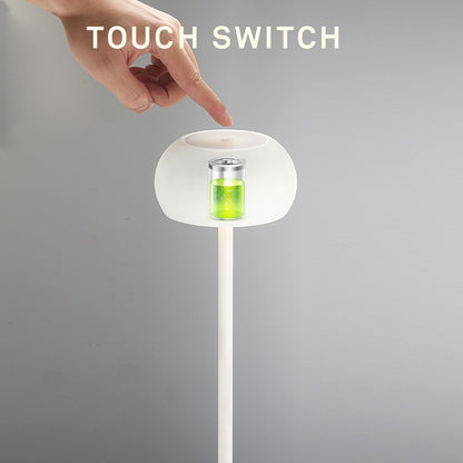 Close-up of Tokyo table lamp touch switch design with sleek, minimalist style and adjustable brightness feature.