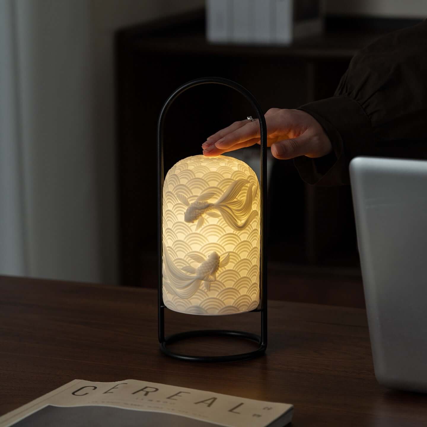 Handcrafted Ceramic Goldfish Lamp with intricate design, providing soft LED light, ideal for home decor.