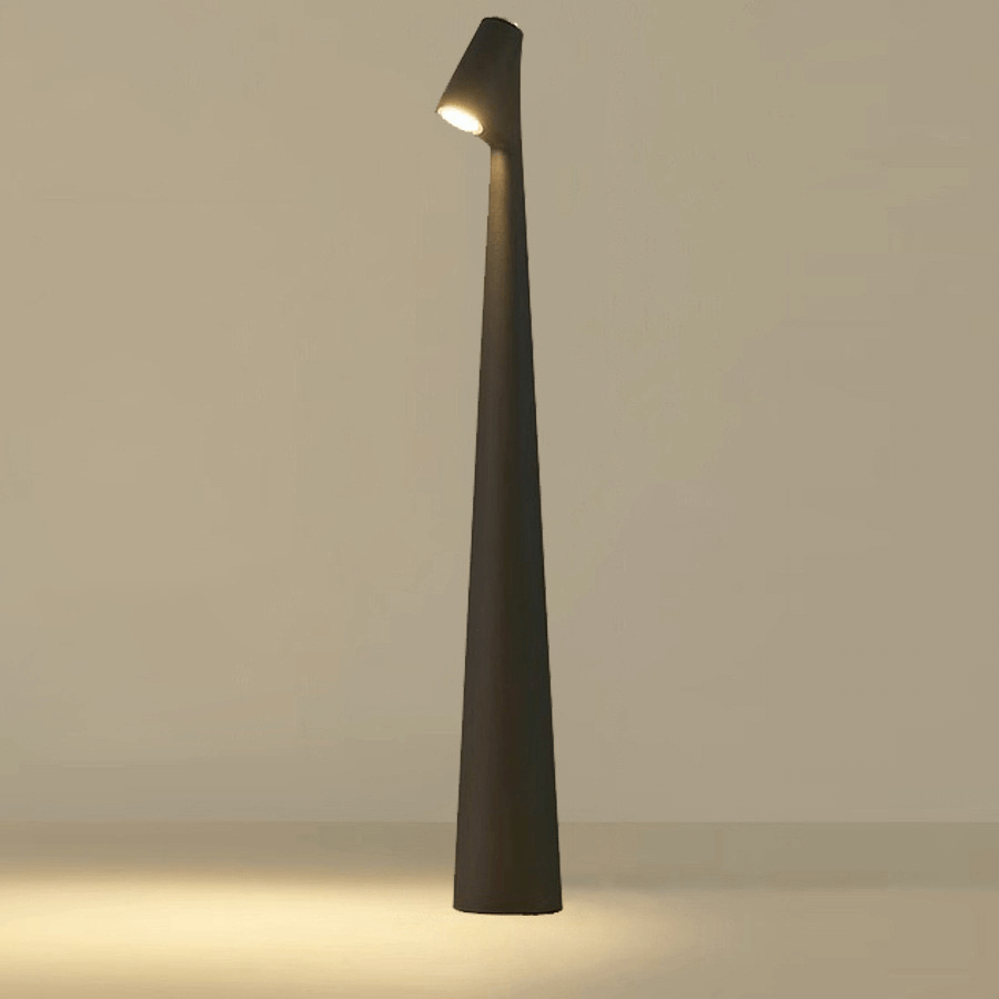 Modern cone-shaped desk lamp with a spotlight, ideal for contemporary workspace or home decor.