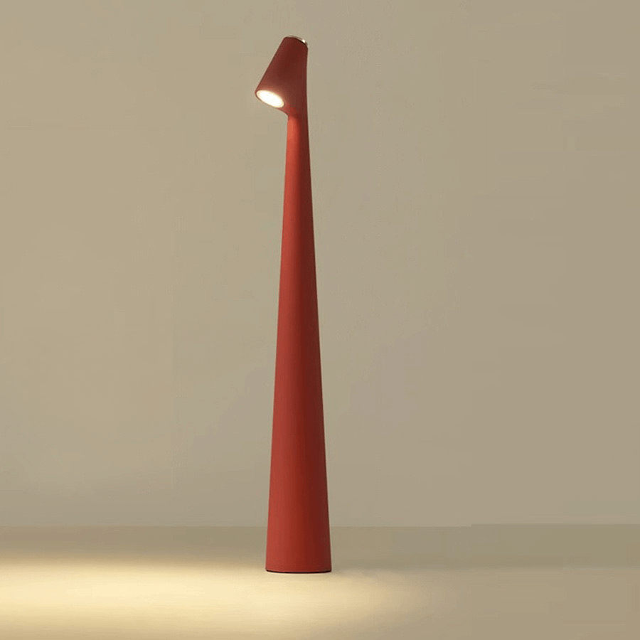 Stylish red touch-control LED desk lamp with a minimalist design, perfect for a modern workspace or bedside.
