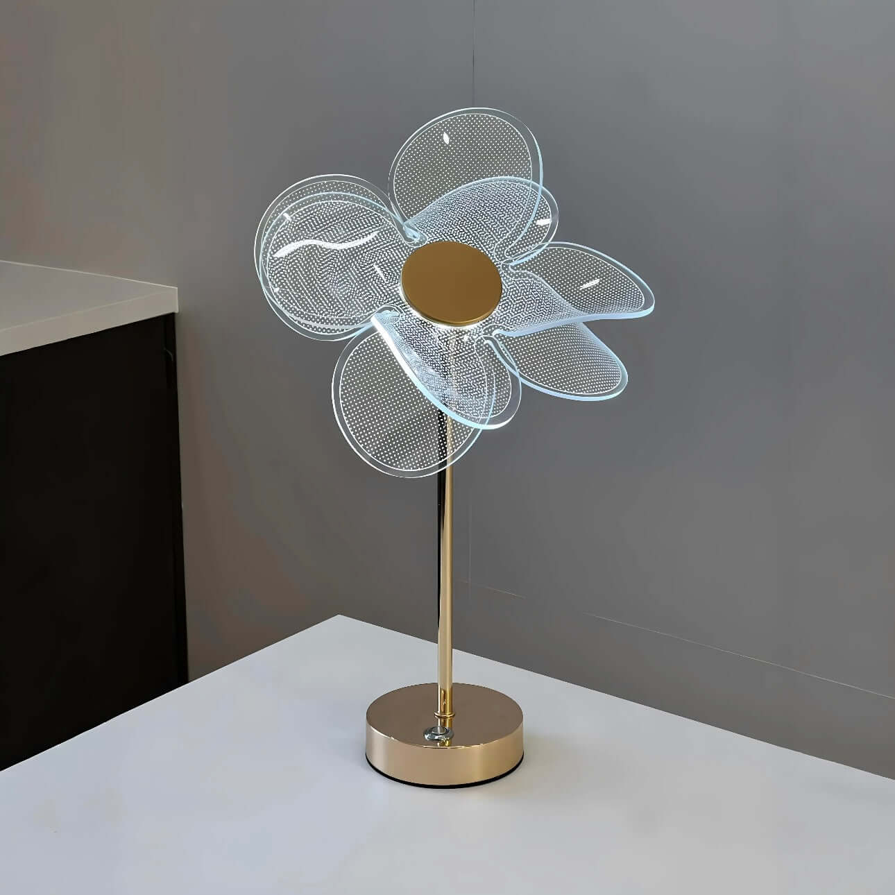 Nordic Clover Table Lamp with unique clover-shaped design, gold base, providing soft LED illumination for modern decor.