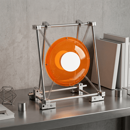 Industrial-style orange acrylic table lamp in a contemporary design studio