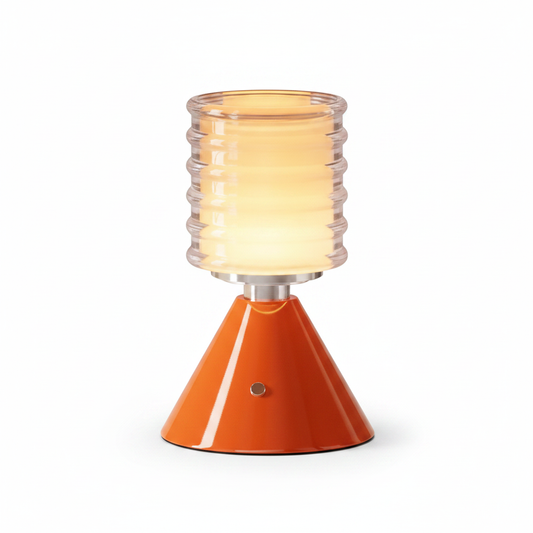`Minimalist rechargeable ambient lamp with ribbed glass shade and orange cone base on white background`