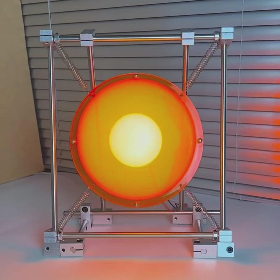 Stainless steel frame and exposed coil springs on a sculptural table lamp